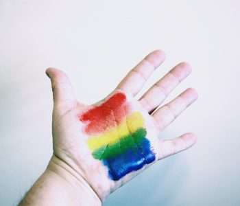 hand with rainbow paint