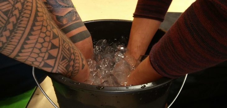 hands in ice bucket