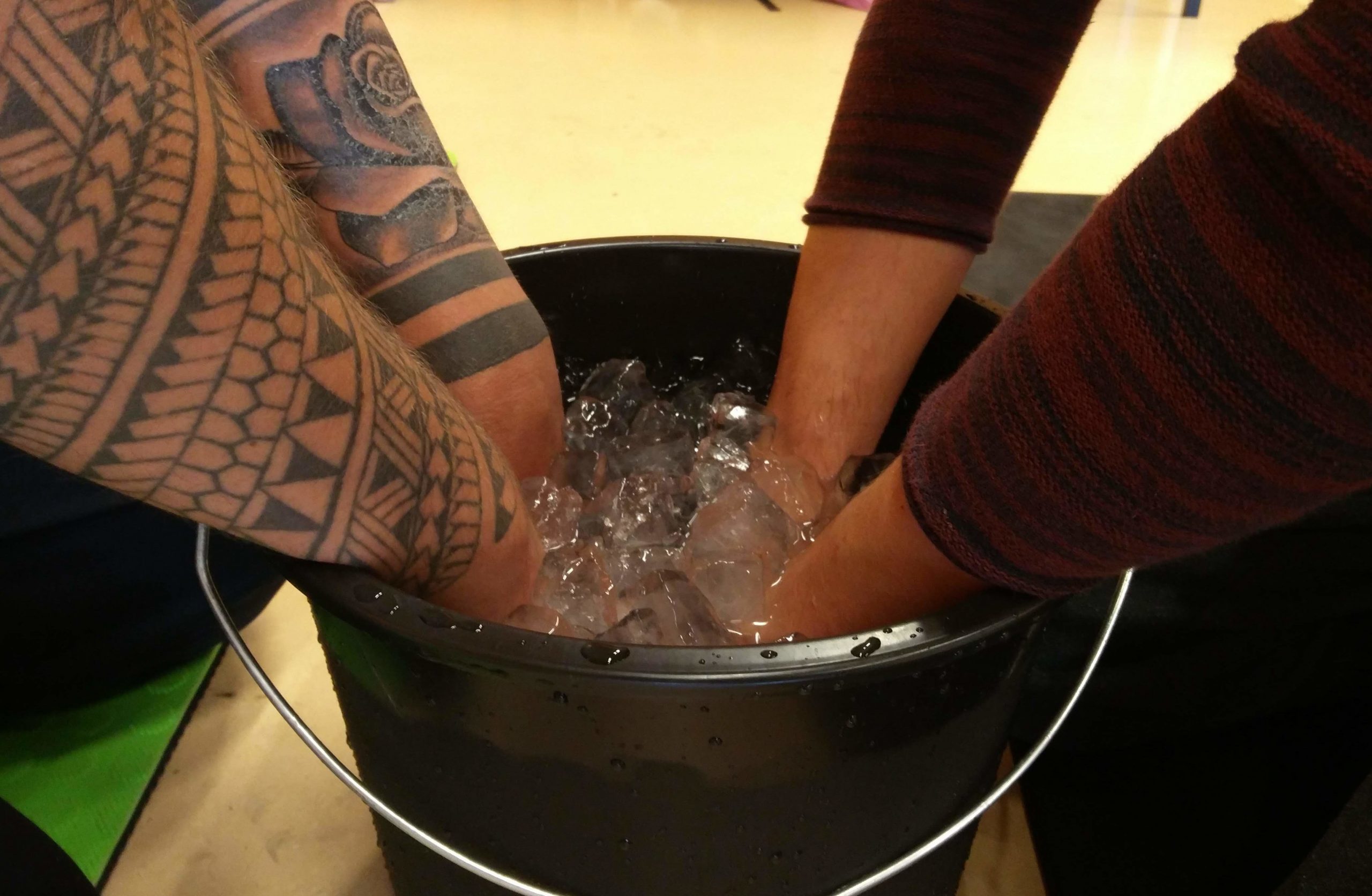 hands in ice bucket